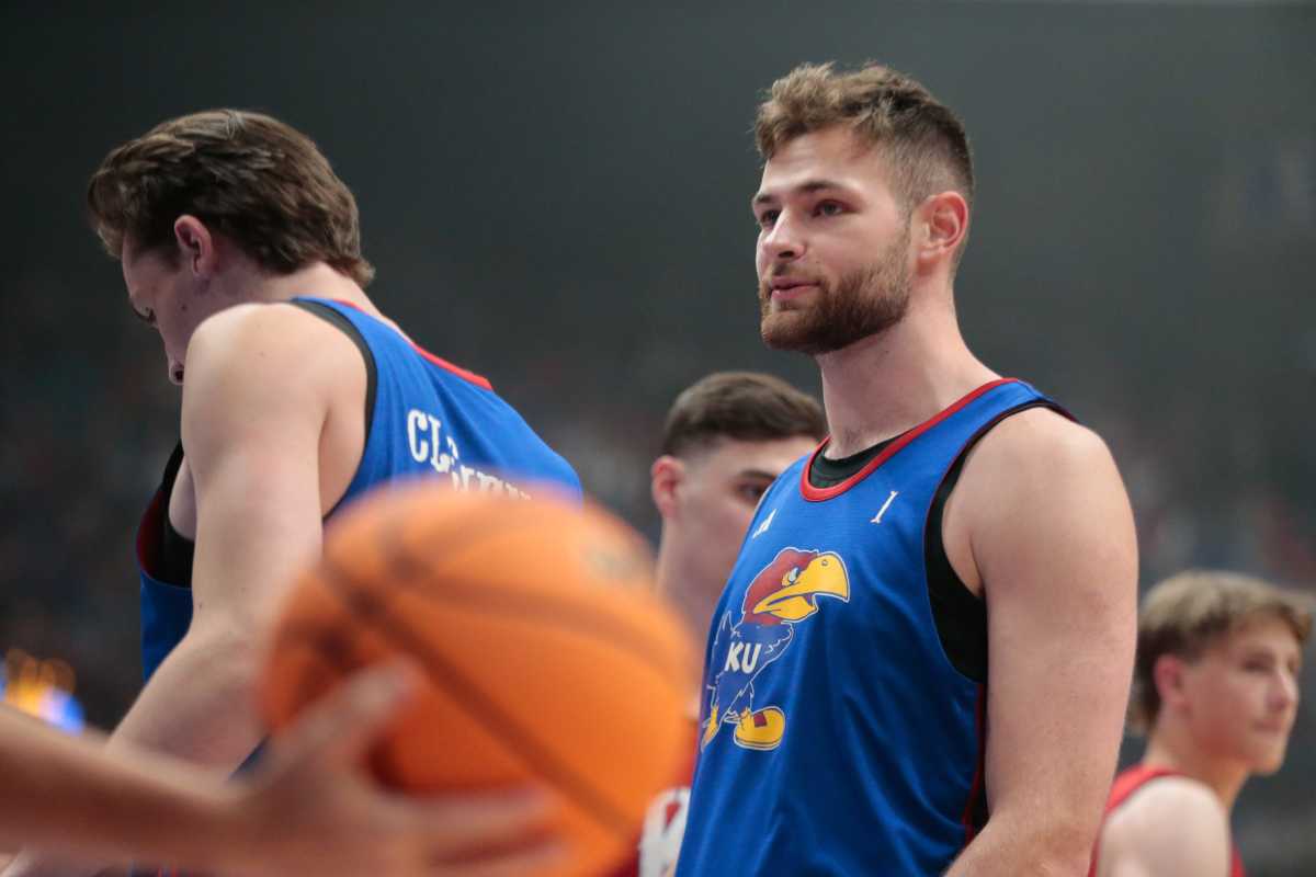 Kansas senior center Hunter Dickinson (1) walks down court during a scrimmage at Friday's Late Night in the Phog inside Allen Fieldhouse.  